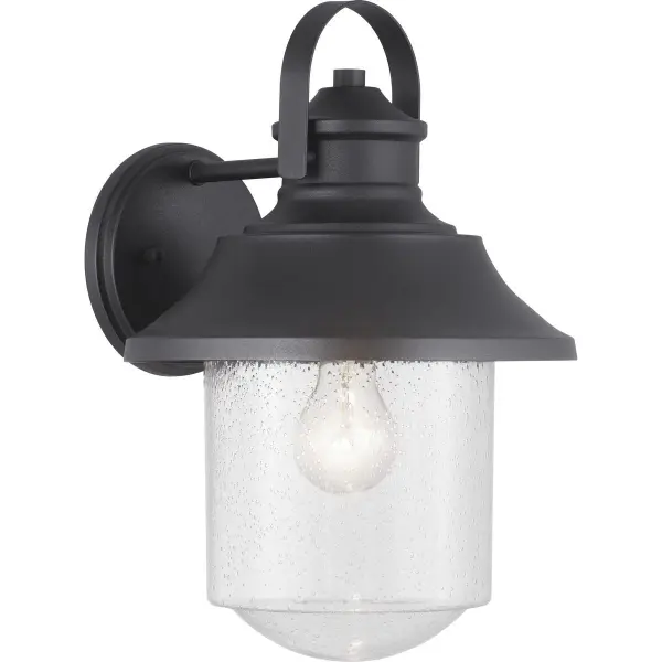 The Weldon Large Wall Lantern combines timeless farmhouse aesthetics with contemporary outdoor performance. Its generous size and clean-lined black finish make it ideal for larger exterior spaces requiring both style and illumination.