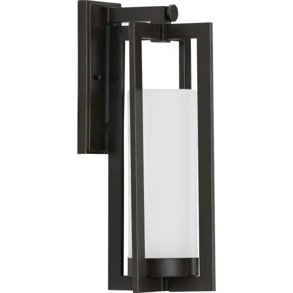 The Janssen wall lantern blends modern design with craftsman influences, featuring an oil rubbed bronze finish that complements both contemporary and traditional exteriors. Its large size makes a bold statement.