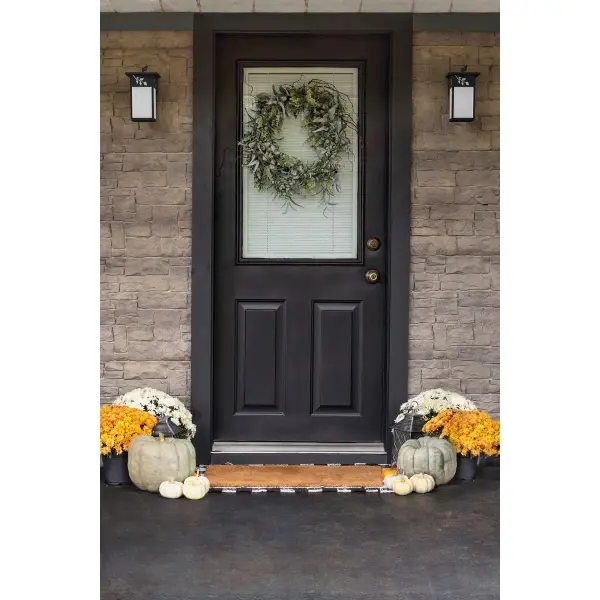 The Trellis Small Wall Lantern brings timeless Craftsman charm to your outdoor spaces with its antique bronze finish and traditional design. Perfect for porches, patios, and entryways seeking authentic period style. - alternate view