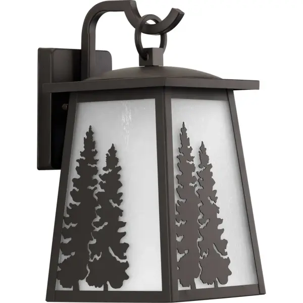 Create a home that is undeniably beautiful with the intricate craftsmanship of this-nature-inspired wall lantern. Beautiful white art glass panels serve as a backdrop to carefully crafted pine tree silhouettes. The panels are housed in a handsome antique bronze frame that will capture the gazes and hearts of both family members and guests. Collection: Torrey Rooms: Outdoor Finish: Antique Bronze Glass: Etched Seeded Width: 7.00" Height: 13.50" Length: 7.00" Weight: 5.47 lb Extension from Wall: 8.37" Wire: 6" Canopy: 0.75"x5.5"x4.5" Number of Bulbs: 1 Maximum Wattage: 100.00 W Bulb Type: A19 Bulb Base: E26 Light Source: Incandescent Voltage: 120.00 V Material: Steel Country of Origin: CN Safety Listing: cCSAus Safety Rating: Wet Title 20 Manufacturer Warranty: 1-year Limited Warranty Spec Sheet Parts Diagram