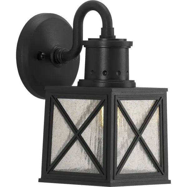 The Seagrove wall lantern combines farmhouse charm with coastal style in a compact design. Features DURASHIELD coating for enhanced weather resistance, making it ideal for porches, patios, and entryways.