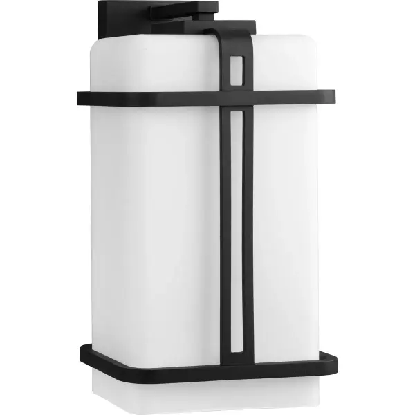 The Ellery wall lantern blends transitional style with modern farmhouse appeal, featuring a clean black finish and generous proportions. JA8 and Title 22 compliant for California installations.