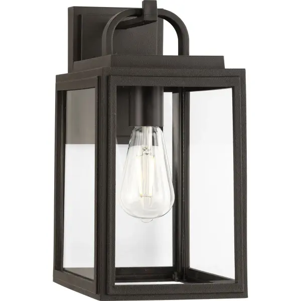 The Grandbury wall lantern combines transitional styling with DURASHIELD technology for lasting outdoor performance. Its antique bronze finish and clear glass panels create welcoming illumination for entryways and porches.