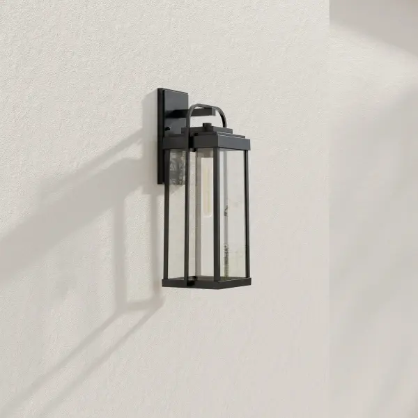 The Walcott Large Wall Lantern combines timeless farmhouse aesthetics with contemporary functionality. Its antique bronze finish and generous size make it ideal for creating a welcoming entrance or illuminating outdoor living spaces.