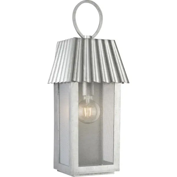 The Point Dume Hook Pond wall lantern combines weather-resistant galvanized finish with DuraShield protection, making it ideal for coastal and high-moisture environments. Its transitional design bridges traditional and contemporary styles.