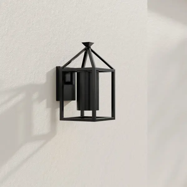 The Stallworth wall lantern brings contemporary style to outdoor spaces with its matte black finish and modern craftsman design. Energy-efficient and Title 24/JA8 compliant, it's ideal for residential porches and patios.
