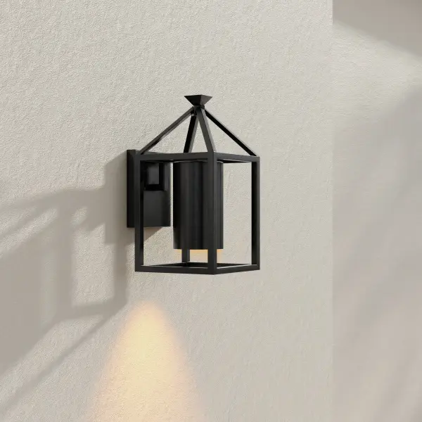 The Stallworth wall lantern brings contemporary style to outdoor spaces with its matte black finish and modern craftsman design. Energy-efficient and Title 24/JA8 compliant, it's ideal for residential porches and patios. - alternate view