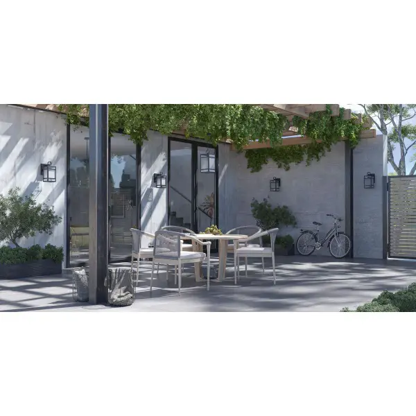 The Parrish wall lantern combines transitional styling with durable outdoor construction. Clear etched glass provides ambient lighting while the matte black finish offers timeless appeal for residential exteriors. - alternate view