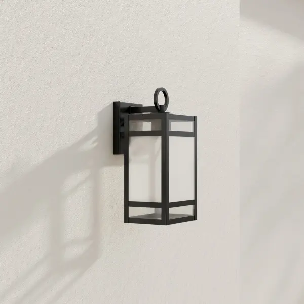 The Parrish wall lantern combines transitional design with practical outdoor lighting. Its clear etched glass and matte black finish create a sophisticated look while meeting California Title 24 and JA8 compliance standards.