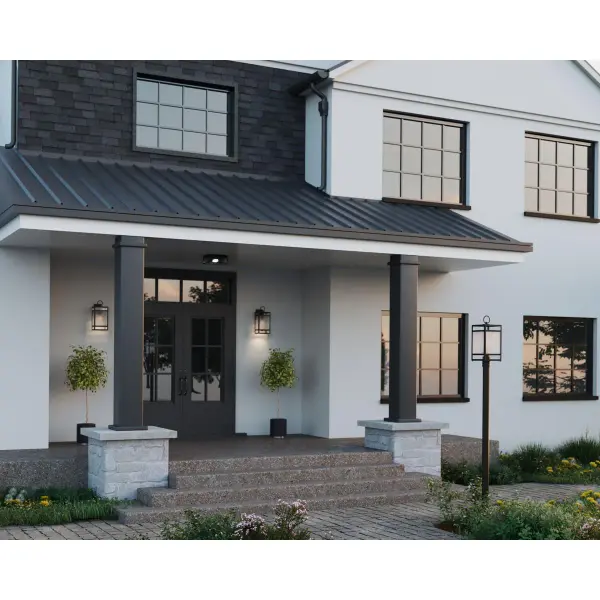 The Parrish wall lantern combines transitional design with practical outdoor lighting. Its clear etched glass and matte black finish create a sophisticated look while meeting California Title 24 and JA8 compliance standards. - alternate view