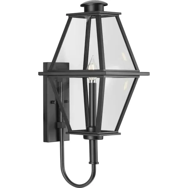 The Bradshaw wall lantern combines traditional charm with transitional versatility, featuring clear glass panels and a durable black finish. Perfect for residential porches and patios, this medium-sized fixture offers timeless appeal with modern compliance standards.