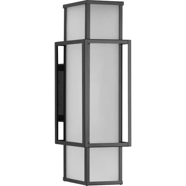 The Unison wall lantern combines contemporary clean lines with farmhouse warmth through its matte black finish and etched seeded glass. Perfect for outdoor spaces, this large-scale fixture provides ample illumination while adding architectural interest.