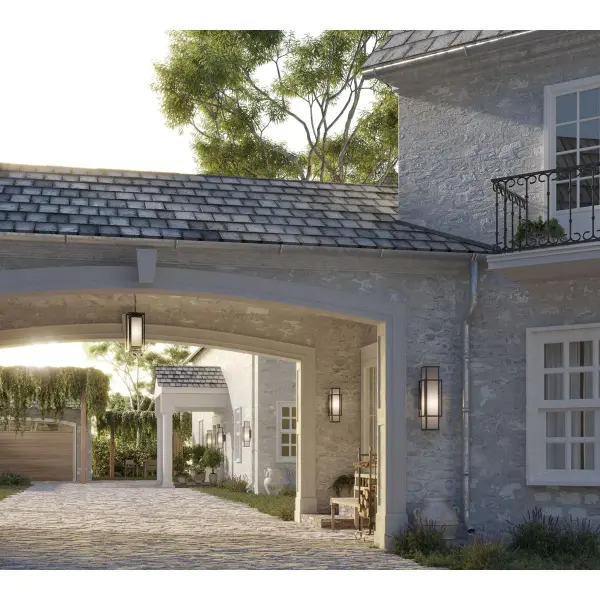 The Unison wall lantern combines contemporary clean lines with farmhouse warmth through its matte black finish and etched seeded glass. Perfect for outdoor spaces, this large-scale fixture provides ample illumination while adding architectural interest. - alternate view