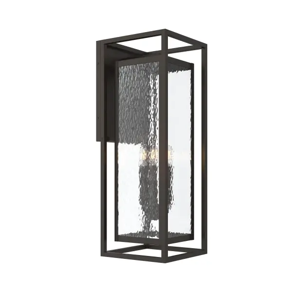 The Shaw Large Wall Lantern combines contemporary design with classic outdoor durability. Its Antique Bronze finish and substantial size make it ideal for illuminating entryways, porches, and patios with sophisticated style.
