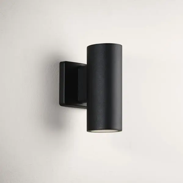 This 3-inch cylinder wall sconce delivers architectural up/down lighting in a compact form. The Antique Bronze finish and clean lines work with modern and transitional exteriors. Title 24 and JA8 compliant for California installations.