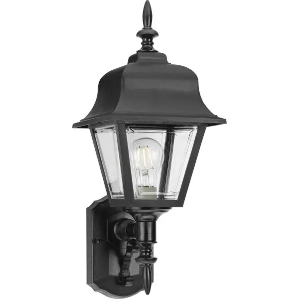 A traditional one-light wall lantern featuring a textured black finish, ideal for residential outdoor applications. JA8 compliant for California energy standards, offering reliable illumination for porches and patios.