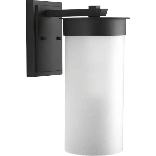 The Hawthorne wall lantern blends transitional design with modern craftsman details in a durable textured black finish. Its large scale makes a bold statement on porches and patios while providing ample illumination.