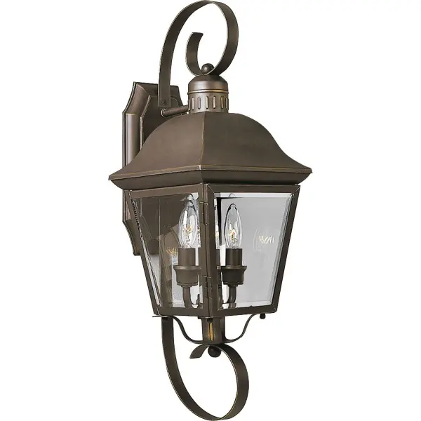 The Andover wall lantern brings traditional elegance to outdoor spaces with its antique bronze finish and clear glass panels. Perfect for porches, patios, and entryways, this medium-sized fixture provides ample illumination while enhancing curb appeal.