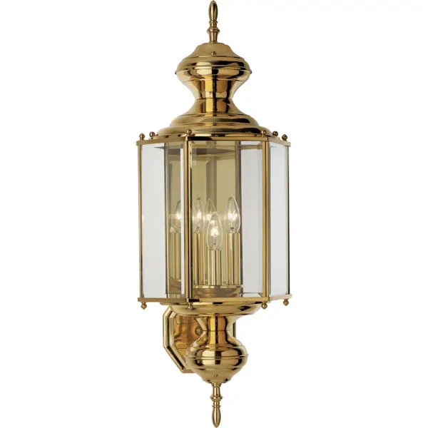 Solid brass hexagonal wall lantern with clear beveled glass panels and BrassGuard finish. Collection: BrassGUARD Lantern Rooms: Outdoor Finish: Polished Brass Glass: Clear Beveled Width: 9.50" Height: 25.38" Length: 9.75" Weight: 5.10 lb Extension from Wall: 9.50" Top to Outlet: 21.00" Wire: 6" Canopy: 5.5"x4.75" Number of Bulbs: 3 Maximum Wattage: 60.00 W Bulb Type: B Bulb Base: E12 Light Source: Incandescent Voltage: 120.00 V Material: Solid Brass Country of Origin: CN Safety Listing: UL-CUL Safety Rating: Wet Title 20 Manufacturer Warranty: 1-year Limited Warranty Spec Sheet Instructions Parts Diagram