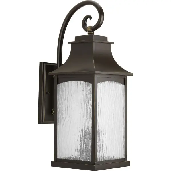 The Maison Large Wall Lantern combines timeless transitional design with farmhouse charm. Its oil rubbed bronze finish and three-light configuration provide substantial illumination for outdoor spaces while maintaining architectural sophistication.