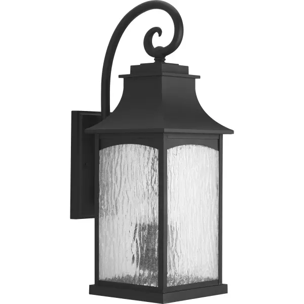The Maison wall lantern combines timeless farmhouse design with contemporary outdoor performance. Its textured black finish and three-light configuration deliver both visual impact and practical illumination for exterior spaces. - alternate view