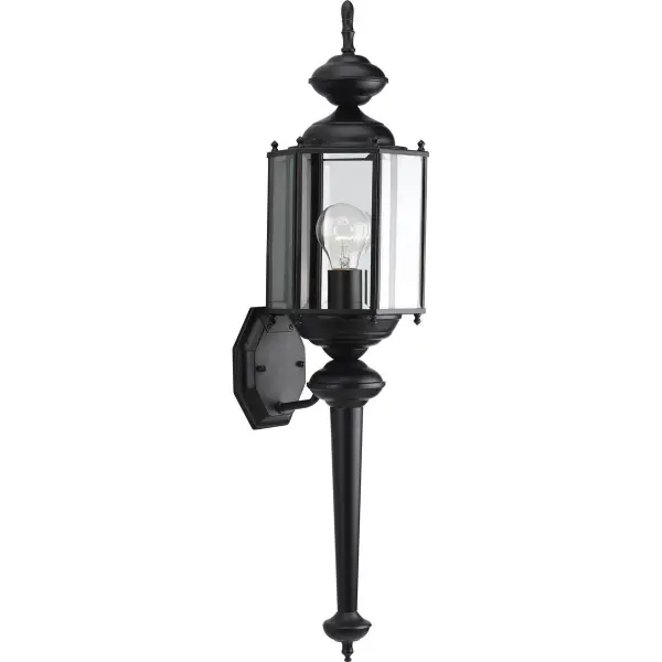 This traditional wall lantern brings vintage carriage house charm to outdoor spaces with its matte black finish and classic glass panels. JA8 compliant for California energy standards, it's ideal for porches and entryways.