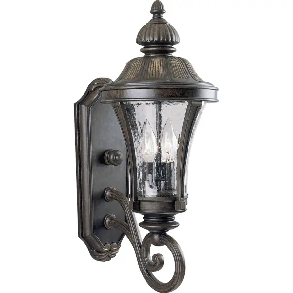 The Nottington Collection features traditional scrolling cast arms, fluted bodies and acorn accents. Clear seeded glass compliments this cast aluminum and brass constructed two-light medium wall lantern. Forged Bronze finish. Collection: Nottington Rooms: Outdoor Finish: Forged Bronze Glass: Water Seeded Width: 8.00" Height: 19.63" Weight: 8.60 lb Extension from Wall: 10.63" Top to Outlet: 10.63" Wire: 6" Canopy: 1.125"x13.625"x5" Number of Bulbs: 2 Maximum Wattage: 60.00 W Bulb Type: B Bulb Base: E12 Light Source: Incandescent Voltage: 120.00 V Material: Cast Aluminum Country of Origin: CN Safety Listing: cCSAus Safety Rating: Wet Title 20 Manufacturer Warranty: 1-year Limited Warranty Spec Sheet Instructions Parts Diagram