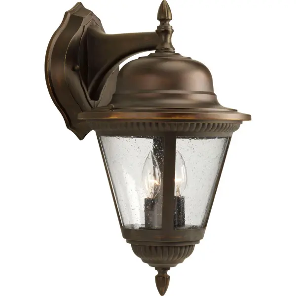 The Westport Large Wall Lantern combines traditional design with durable outdoor construction. Its antique bronze finish and clear seeded glass create warm, welcoming illumination for entryways and outdoor living spaces.