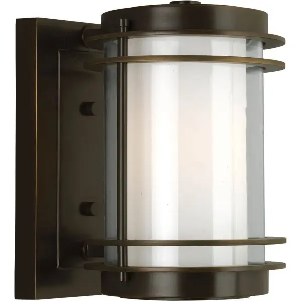 The Penfield wall lantern combines timeless transitional styling with modern outdoor performance. Its oil rubbed bronze finish and clean lines complement both traditional and contemporary exteriors.