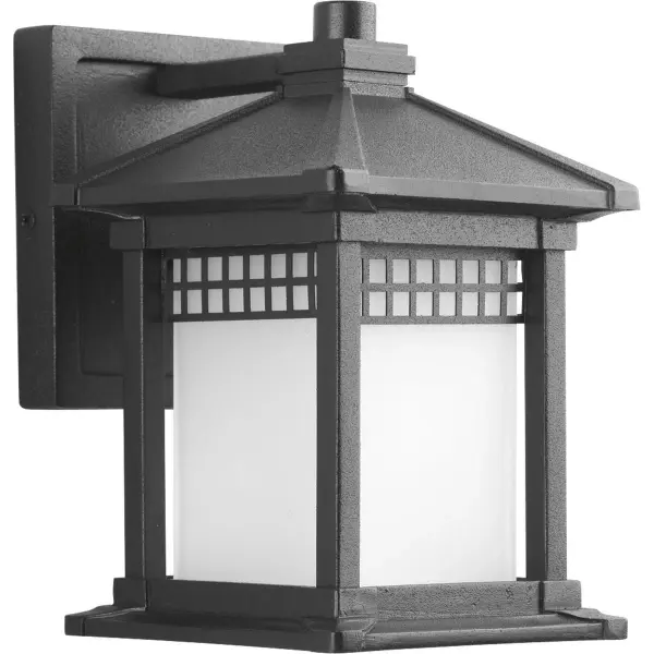 The Merit Collection wall lantern blends classic Craftsman design with contemporary clean lines. Its textured black finish and JA8-compliant construction make it ideal for modern mountain homes and residential outdoor spaces.