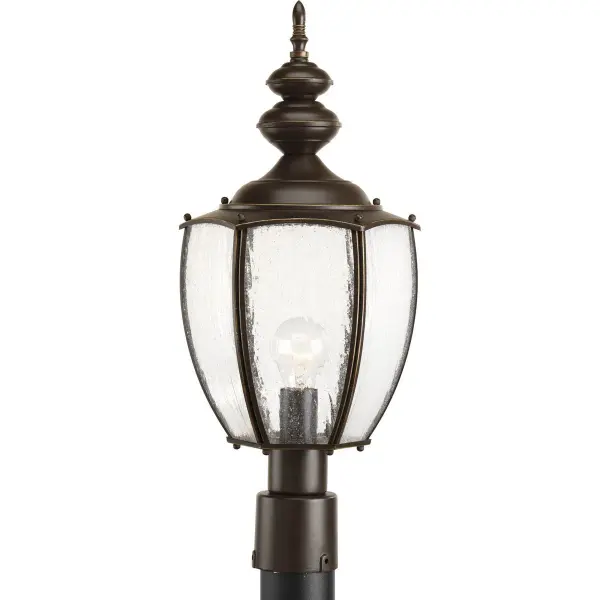 This traditional post lantern brings timeless curb appeal with its Roman coach-inspired design and antique bronze finish. Perfect for illuminating pathways, driveways, and outdoor living spaces with classic style.