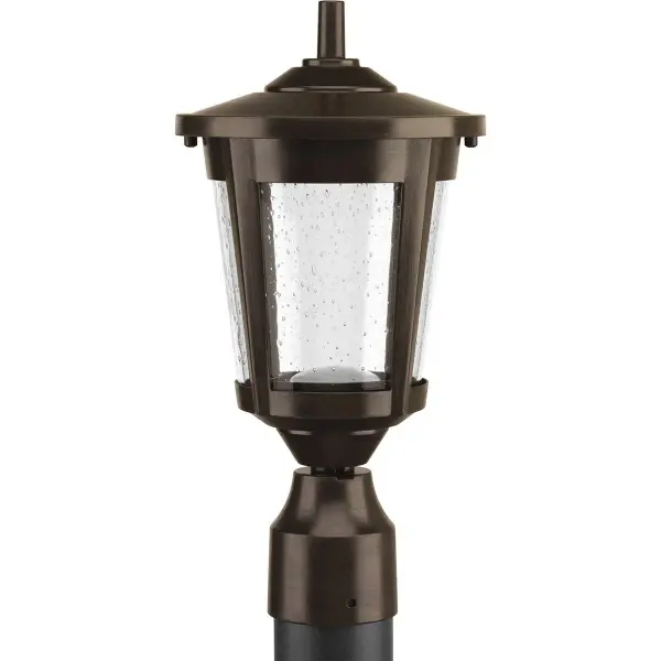 The East Haven LED Post Lantern combines timeless design with modern efficiency. Its Antique Bronze finish and clear glass panels create welcoming outdoor illumination while meeting Title 24 and JA8 compliance standards. - alternate view