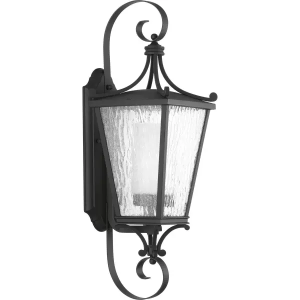 The Cadence wall lantern combines timeless traditional design with contemporary outdoor lighting technology. Its textured black finish and clean lines make it versatile for both classic and transitional exteriors.