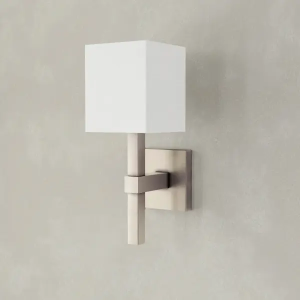 The Metro Collection wall sconce blends transitional elegance with modern farmhouse charm. Its brushed nickel finish and clean lines make it ideal for bathrooms, hallways, and dining spaces seeking understated sophistication.