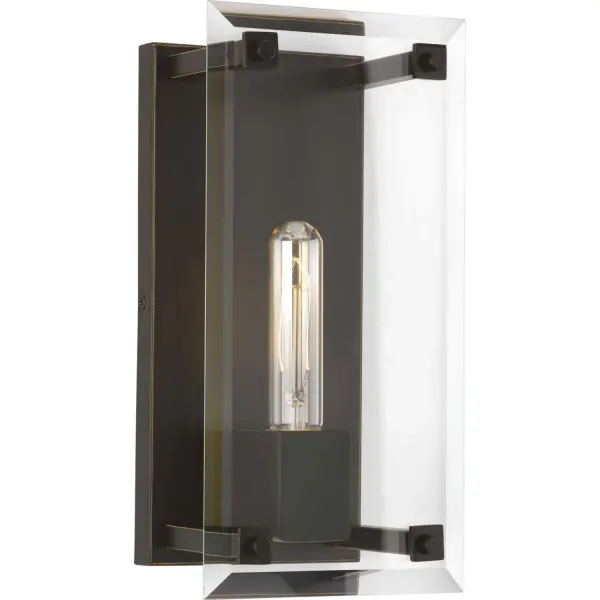 Modern traditional design, commonly referred to as MoTra, is the combination of crisp geometric forms in classic shapes and materials. Hobbs delivers on this concept with an elegant beveled glass diffuser framing a vintage light bulb. The rectangular and circular fittings add a sense of classic craftsmanship for a sense of rich detail. Antique Bronze finish. Collection: Hobbs Finish: Antique Bronze Glass: Clear Width: 6.00" Height: 12.00" Weight: 5.10 lb Extension from Wall: 4.88" Top to Outlet: 6.00" Wire: 6" Canopy: 0.75"x11"x5" Number of Bulbs: 1 Maximum Wattage: 60.00 W Bulb Type: A19 Bulb Base: E26 Light Source: Incandescent Voltage: 120.00 V Material: Steel Country of Origin: CN Safety Listing: cCSAus Safety Rating: Damp Title 20 Manufacturer Warranty: 1-year Limited Warranty Spec Sheet Instructions Parts Diagram