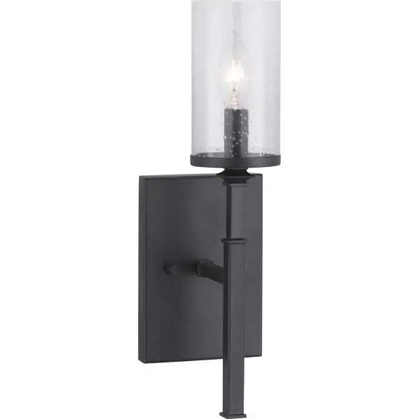 The Gresham wall sconce blends farmhouse charm with contemporary styling through its clean lines and graphite finish. Perfect for residential spaces needing ambient lighting with character.
