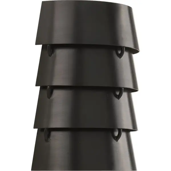 The Point Dume Surfrider Wall Sconce blends modern coastal aesthetics with urban industrial touches. Its Antique Bronze finish adds warmth while maintaining contemporary appeal, making it versatile for residential and hospitality settings.