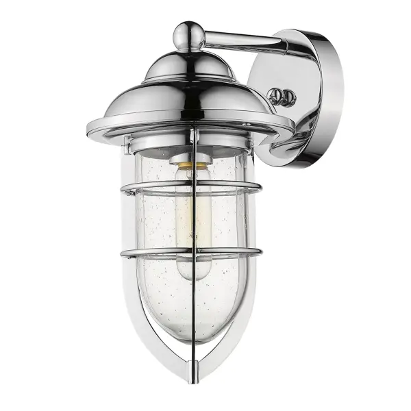 The Dylan wall sconce combines polished chrome with clear seeded glass for a transitional look that works in coastal, industrial, and traditional settings. Compact 13-inch height makes it ideal for flanking doors or illuminating smaller outdoor spaces.