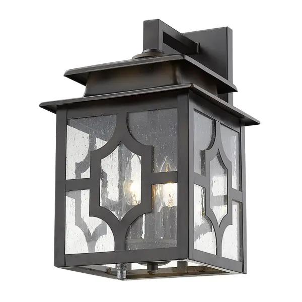 The Calvert 3-Light Wall Sconce combines traditional styling with durable steel construction and charming seeded glass panes. Perfect for adding welcoming illumination to outdoor entryways and porches. - alternate view