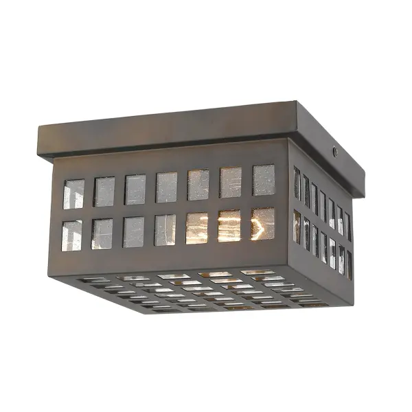The Letzel flush mount combines durability with style, featuring stainless steel construction and seeded glass for visual interest. Its compact 8.75-inch profile makes it ideal for covered outdoor spaces. - alternate view