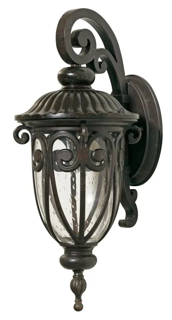 The Naples wall sconce combines traditional styling with weather-resistant cast aluminum construction. Hand-blown clear seeded glass creates ambient lighting while the marbleized mahogany finish adds warmth to outdoor spaces.
