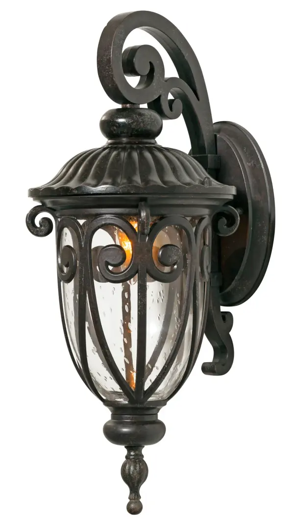 The Naples wall sconce combines traditional styling with weather-resistant cast aluminum construction. Hand-blown clear seeded glass creates ambient lighting while the marbleized mahogany finish adds warmth to outdoor spaces. - alternate view