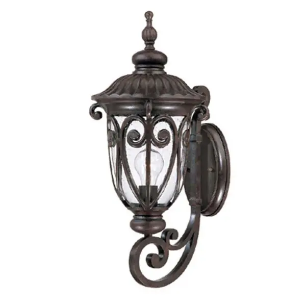 The Naples wall lantern combines traditional styling with durable cast aluminum construction. Hand-blown clear seeded glass creates beautiful light patterns while the marbleized mahogany finish adds warmth to outdoor spaces.