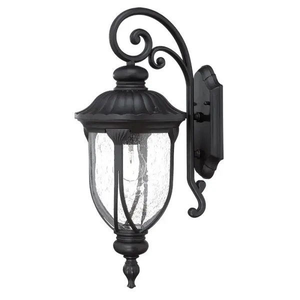 The Laurens wall sconce combines durable cast aluminum construction with charming clear seeded glass, creating a timeless outdoor lighting solution that works beautifully in traditional and coastal settings.