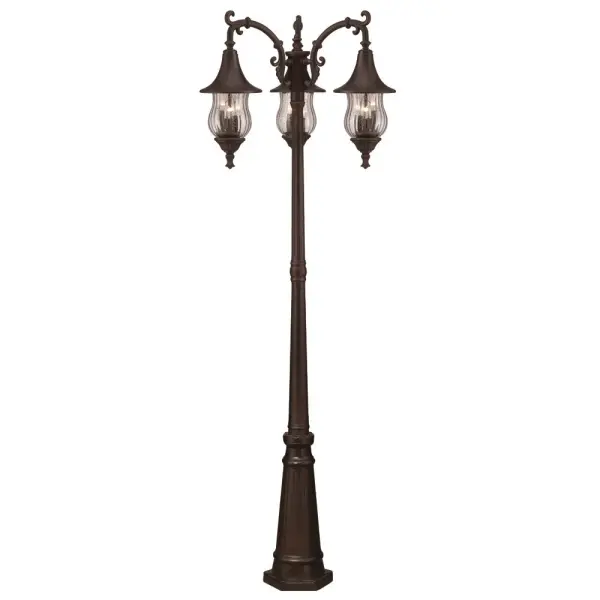 The Del Rio 3-Head Post Light combines durable cast aluminum construction with classic seeded glass for a sophisticated outdoor lighting solution. Standing 81 inches tall with a 29-inch spread, this fixture delivers ample illumination.