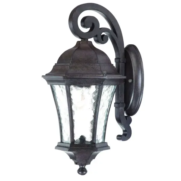 The Waverly wall sconce combines traditional design with coastal-inspired hammered water glass, creating beautiful light patterns. Its cast aluminum construction ensures long-lasting outdoor durability in a compact profile.