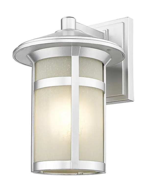 The Phoenix wall sconce combines weather-resistant MarbleX® construction with frosted linen glass for soft, welcoming outdoor illumination. Its brushed steel finish and compact 12" profile make it ideal for entryways and patios.