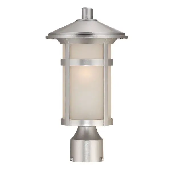 The Phoenix Post Lantern combines traditional styling with modern MarbleX composite material for weather-resistant outdoor illumination. Its brushed silver finish and frosted linen glass create warm, welcoming light.