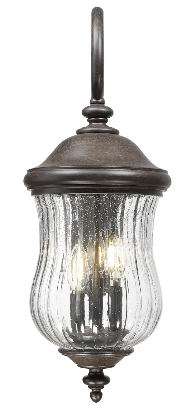 The Bellagio 3-Light Wall Lantern combines traditional styling with modern durability. Its MarbleX composite construction offers weather resistance while the clear seeded glass creates beautiful ambient lighting for outdoor spaces. - alternate view