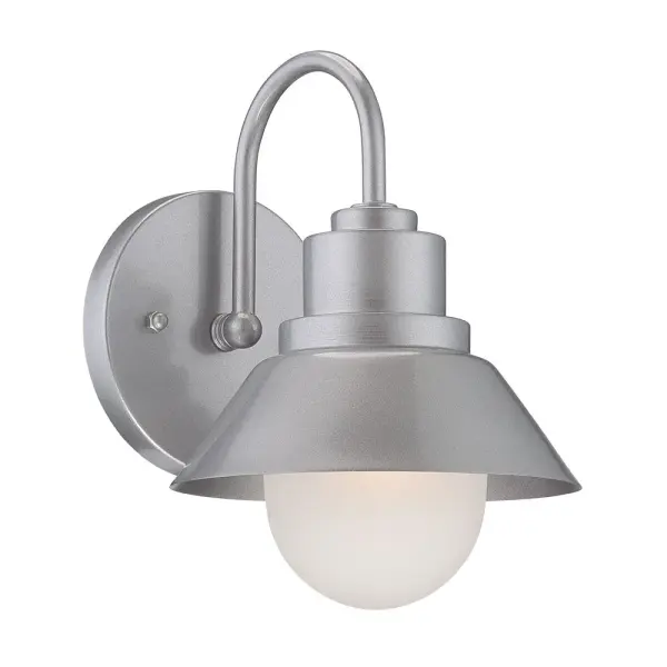 The Astro wall sconce combines modern styling with practical outdoor lighting. Its brushed steel finish and frosted seeded glass create ambient illumination perfect for entryways and patios.